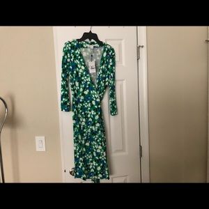 Brand new designer dress! Gorgeous green flower.